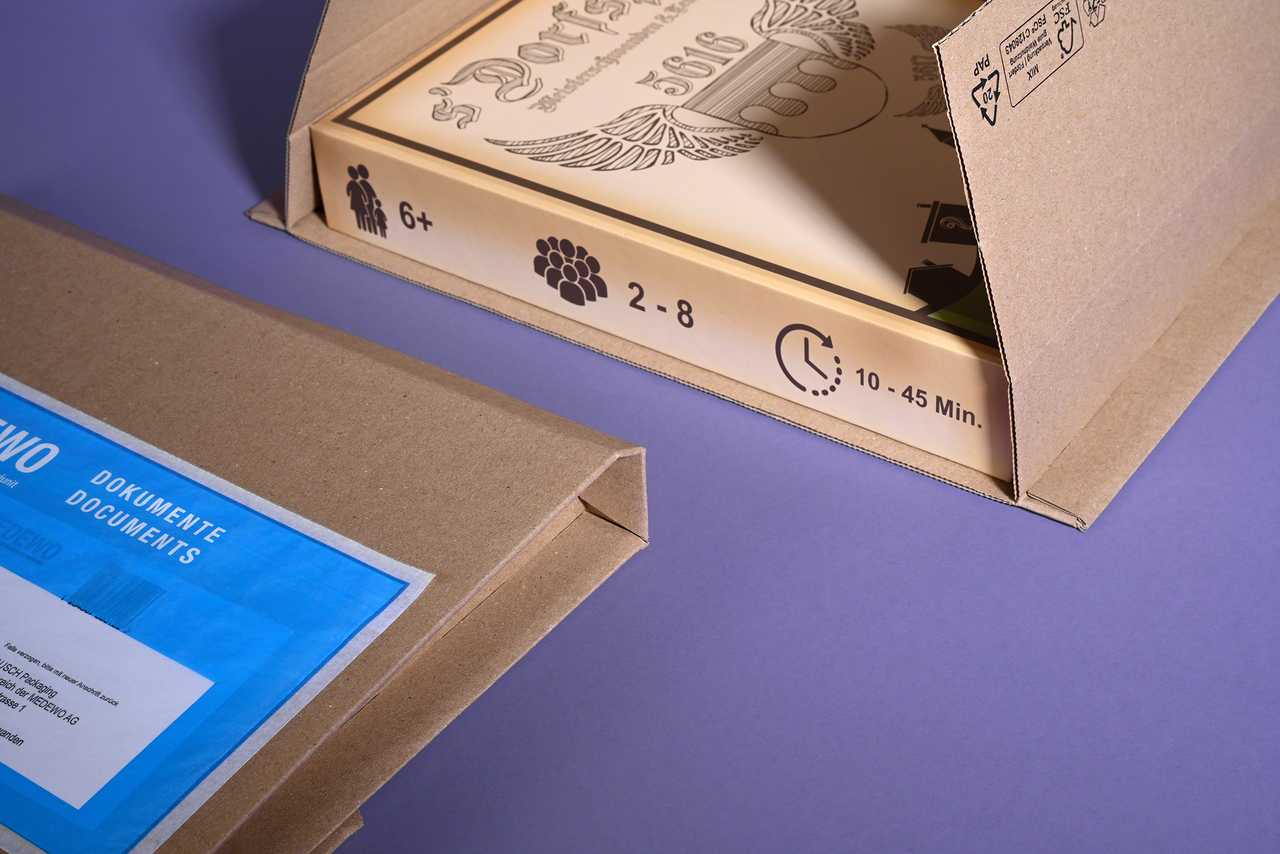  braune Buchverpackung mit umlaufendem Kantenschutz