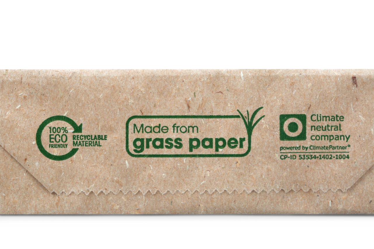 Aufdruck weist auf nachhaltiges Graspapier-Material hin