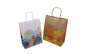 Papiertragetasche mit bunten Kreisen